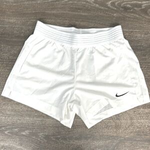White Nike running shorts